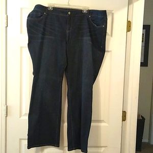 Torrid denim boot cut jeans with studded pockets.